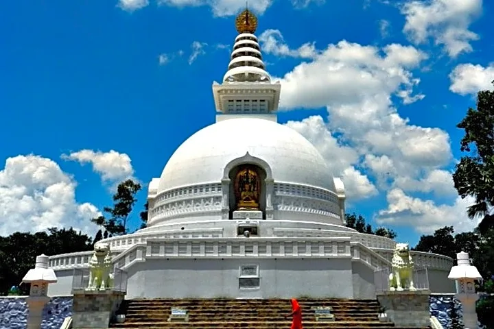  White Vishwa Shanti Stupa with aerial valley view

